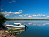 Boat Sitting in the Water with Blue Sky